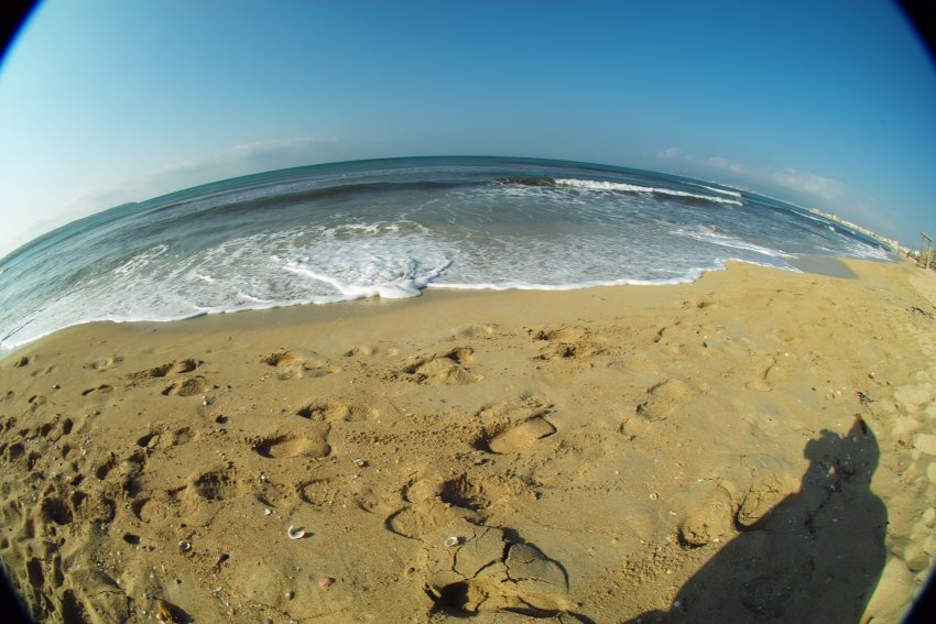 Strandidyll - die Erde ist eine Kugel